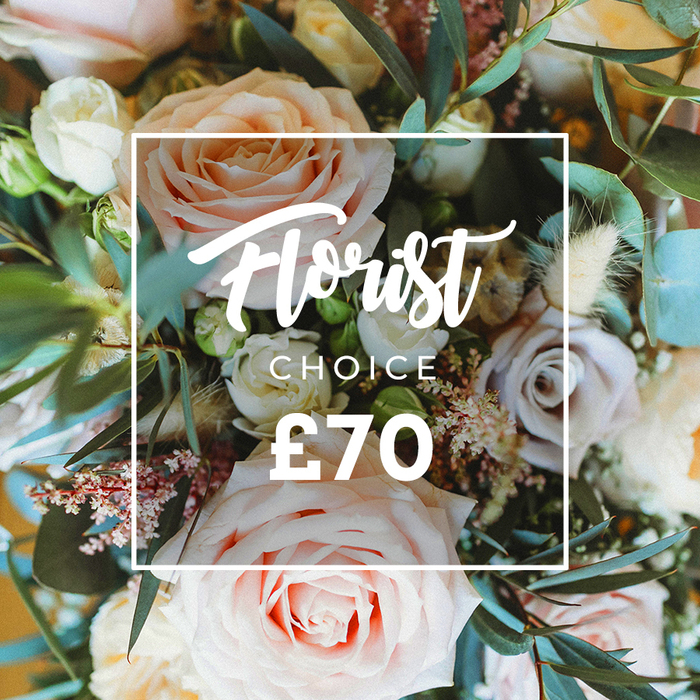 A vibrant, overhead close-up of an artisan Florist Choice bouquet, composed to showcase bouquet-making craft and subtle colour harmonies. Large roses in delicate blush pink, creamy white and warm peach unfold across the frame, their velvety layers catching soft daylight. Here and there, dusky lavender or dusty mauve roses add a cool counterpoint; tiny white filler flowers and whispery sprays of pale pink waxflower create a lace-like network between the larger blooms. Accents of small pink berries and fluffy dried elements-cream and tan seed pods and ornamental grasses-introduce a textural, slightly rustic note that balances the roses' lushness. Rounded eucalyptus leaves, their silvery-green tone distinct, weave through the arrangement to provide contrast and a fresh, green scent that lifts the composition. Laid over the centre is a crisp white square outline containing the promotional text: Florist Choice in graceful script, CHOICE in a neat sans-serif beneath, and the price ?70 displayed prominently at the bottom in bold white numbers.

Captured with a soft-focus background and natural side light, the bouquet conveys a refined, romantic atmosphere suited to thoughtful gifting-weddings, anniversaries, or an elegant surprise for a friend. As prepared by a local florist familiar with Finsbury's tastes, including selections popular with customers near Finsbury Square and City Road, the arrangement blends longevity and beauty. For those who prefer to order online, this curated option is typically offered through finsburyflowers.co.uk and is arranged to be delivered across Finsbury and neighbouring Islington streets with attention to presentation and freshness.
