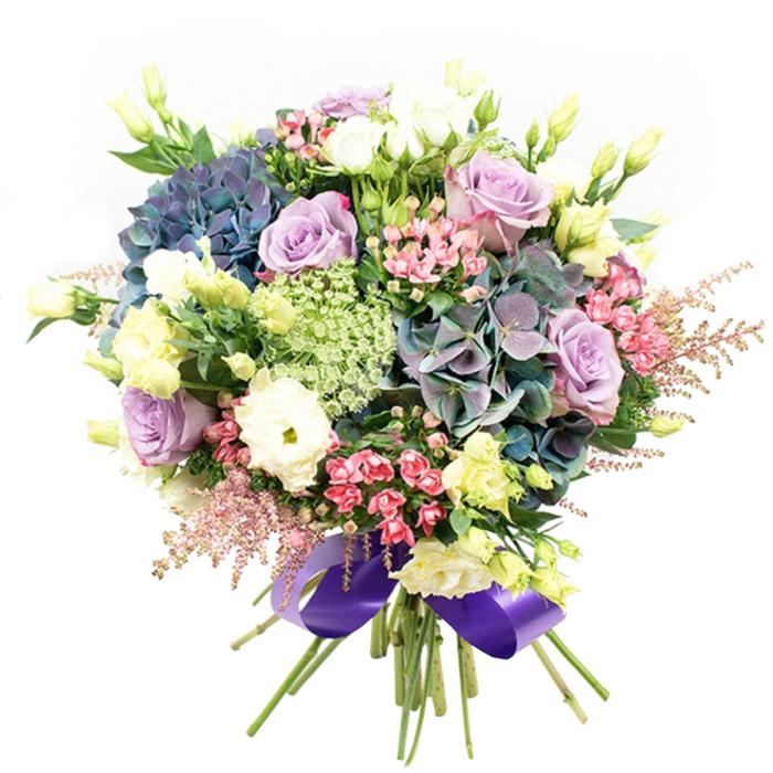 Alive with colour and texture, this sophisticated floral bouquet channels the essence of Finsbury's artistic flair and timeless elegance. Central to the design are robust hydrangeas, their blooms flowing in gradients of indigo blue, teal, and soft purple, giving the arrangement rich depth and remarkable volume-much like the lush greenery of local parks. Surrounding the hydrangea's grandeur, soft lavender roses and classic white blossoms offer a romantic balance, their petals layered and gently unfurled. The inclusion of pure white ranunculus provides further softness, with multi-petaled, almost ruffled forms that fill the composition with inviting tactility. Rising up from the core, slender pale yellow eustoma and lisianthus stems, some in bud, others delicately blooming, lend freshness and light, suggesting the first signs of spring in local Finsbury gardens. Flashes of bright fuchsia-pink and wisps of pale pink astilbe at the bouquet's fringes add lively movement and subtle colour contrast, imbuing the piece with an aura of gentle celebration. Intricate filler blooms of translucent green and white, resembling Ammi Majus or Queen Anne's Lace, weave through, introducing an airy, lacy complexity. The arrangement's rich tones are grounded by glossy green foliage, providing visual stability and natural harmony. Gathered tightly and finished with a wide, regal royal purple satin ribbon, this bouquet radiates polish and sophistication. Ideal for celebratory occasions, heartfelt gifting, or elevating a local home, it is a tribute to Finsbury's blend of history, beauty, and innovation.